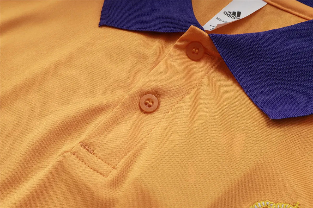 Camisa Real Madrid 2025/26 Edição Polo - Laranja - Versão Torcedor