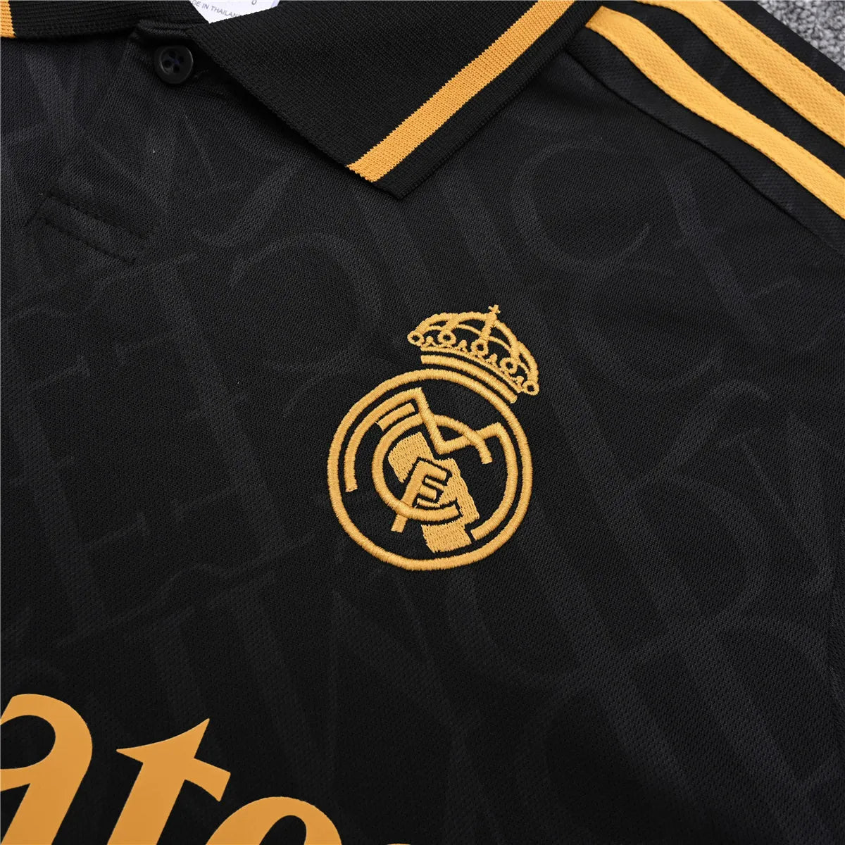 Camisa Real Madrid 2025/26 Edição Polo - Preto/Dourado - Versão Torcedor