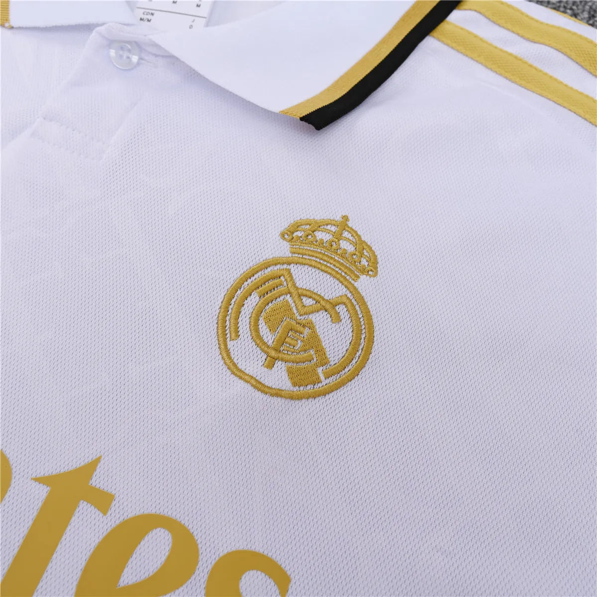 Camisa Real Madrid 2025/26 Edição Polo - Branco/Dourado - Versão Torcedor
